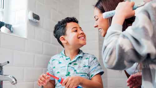When should a child brush teeth alone?